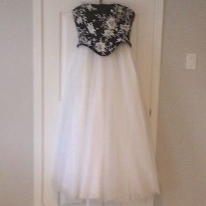Floor length, 2 piece, white layered tulle skirt with black strapless top.